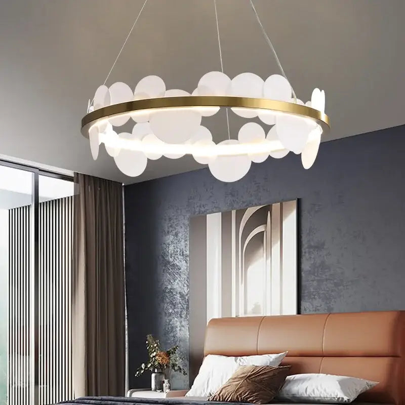 Modern decorbites™ acrylic ceiling chandelier with gold-toned frame and white cloud-shaped diffusers for indoor lighting
