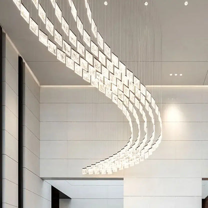 Decorbites™ acrylic chandelier lights feature a modern curved design with translucent square acrylic panels for home lighting
