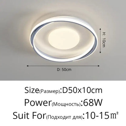 Modern circular acrylic chandelier with sleek chrome frame and soft white light for minimalist indoor spaces