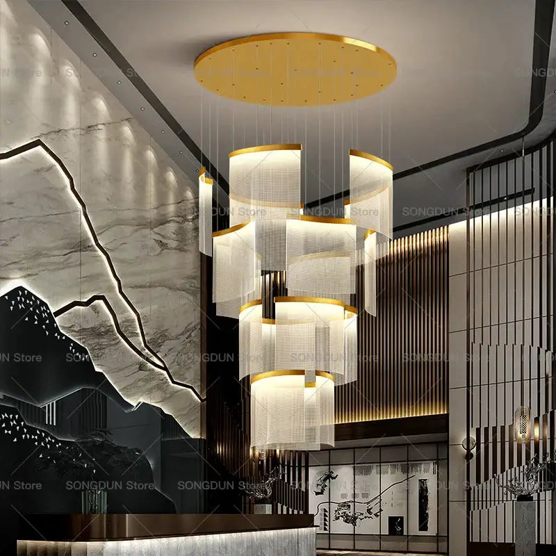 Golden acrylic chandelier with tiered translucent cylindrical shades suspended by rods modern nordic style lighting