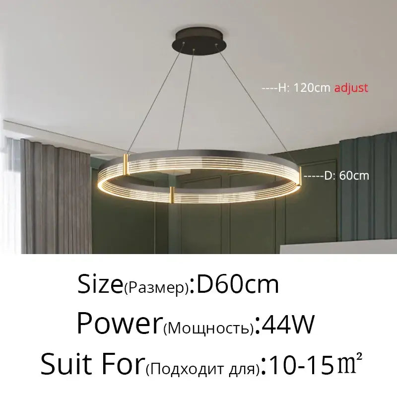 Modern pendant lights featuring a sleek metallic acrylic circle chandelier with warm LED lighting and adjustable height