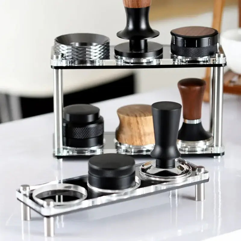 Set of espresso tampers with black and wood handles and stainless steel bases for decorbites acrylic coffee bar powder press
