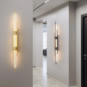 Modern gold-toned copper wall sconce with vertical led strips and minimalist acrylic copper wall design for living rooms