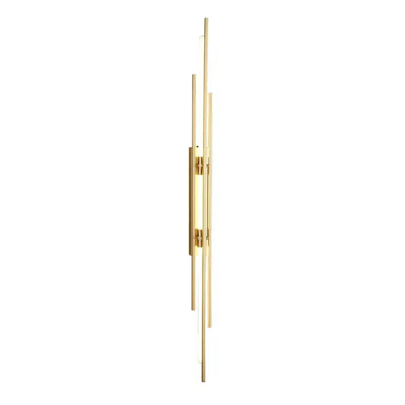 Modern gold-toned acrylic copper wall sconce with slender vertical bars and frosted glass accents for living room lighting