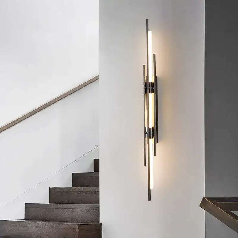 Decorbites™ acrylic copper wall sconce with vertical brushed metal rods and warm led light tubes for minimalist living rooms