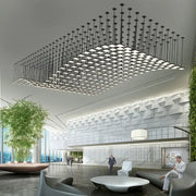 A modern black pendant light with acrylic crystal hanging square panels and slender rods for living room or lobby