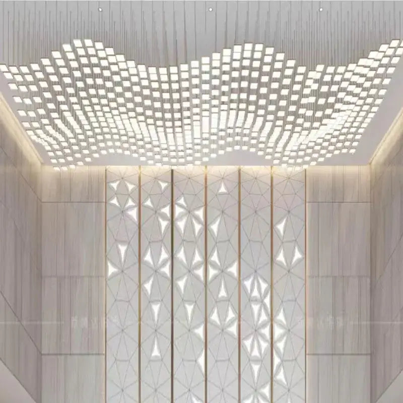 DecorBites™ modern acrylic crystal hanging pendant light with geometric square panels emitting soft white light for living room