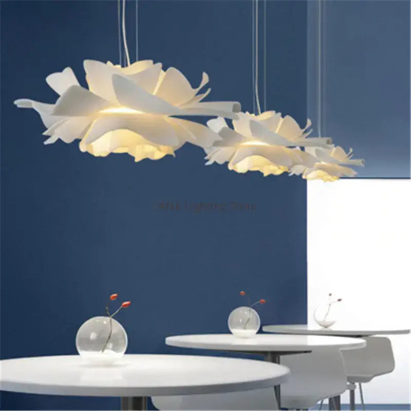 White acrylic flower chandelier pendant light with soft glowing illumination for dining and bedroom decor
