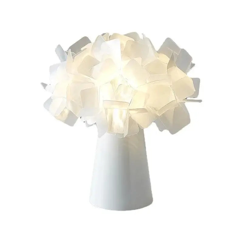 Decorbites™ acrylic flower led table lamp is a white flower led table with layered petals and a sleek conical base