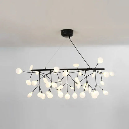 Black metal led hanging light chandelier with frosted glass globes in a branching design for modern island lighting