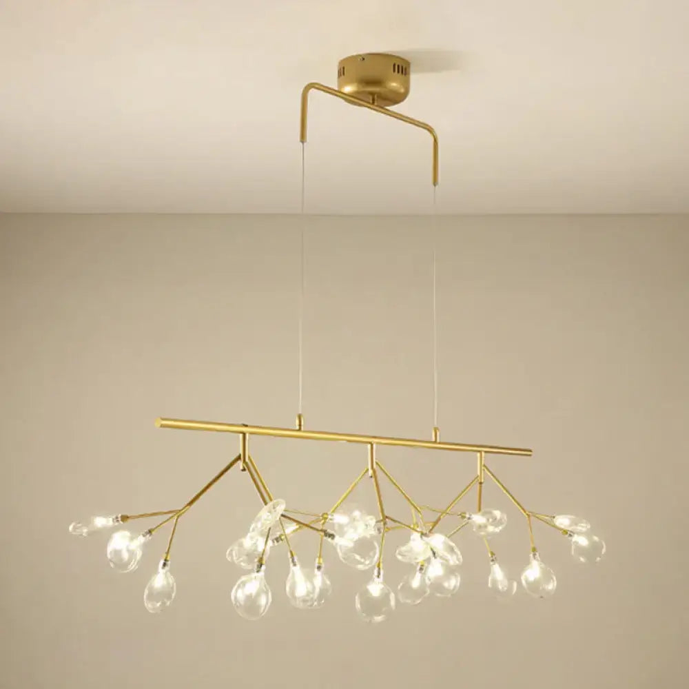 Gold-toned firefly metal pendant chandelier with adjustable hanging cord and 27 clear glass globe bulbs for bedroom lighting