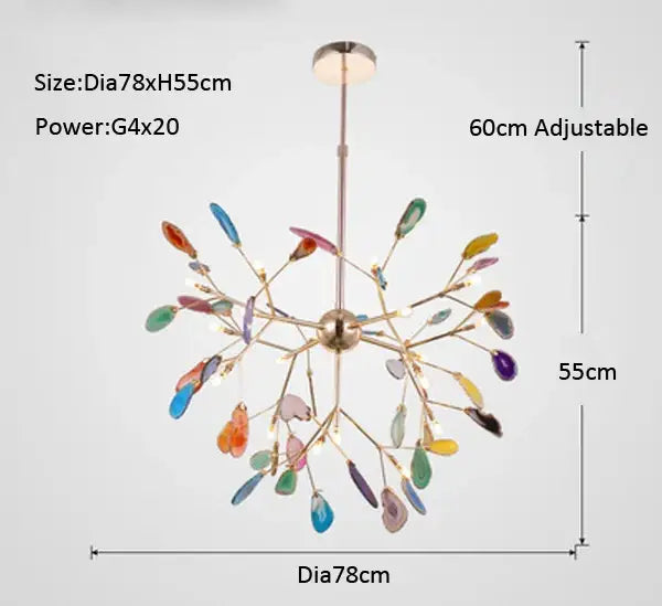 A modern decorbites agate branch chandelier with a brass fixture and colorful glass leaf shades for dining rooms
