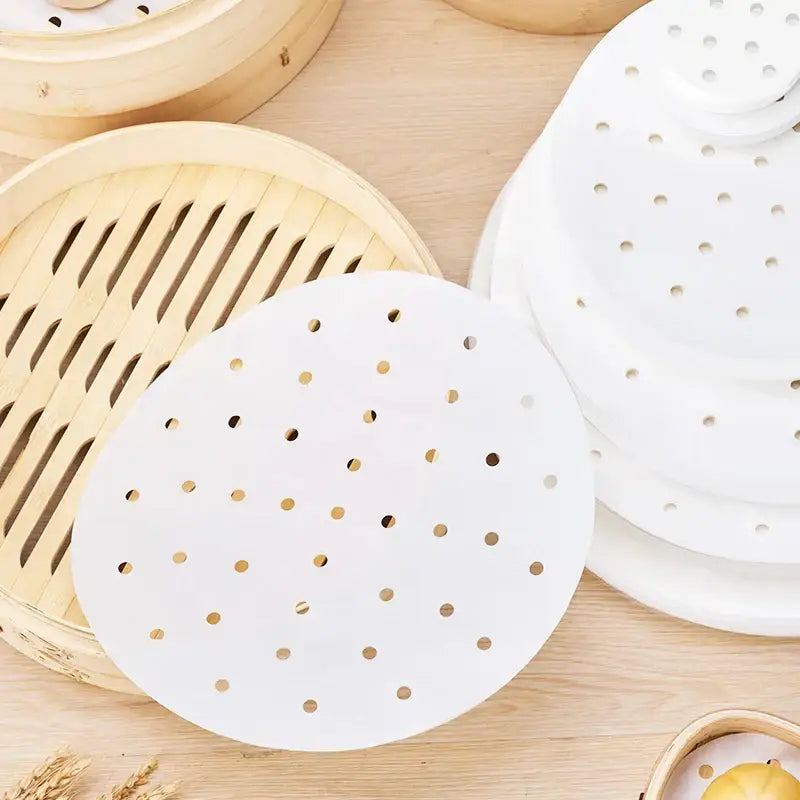 White perforated bamboo steamer tray with circular holes for decorbites™ air fryer steamer papers use