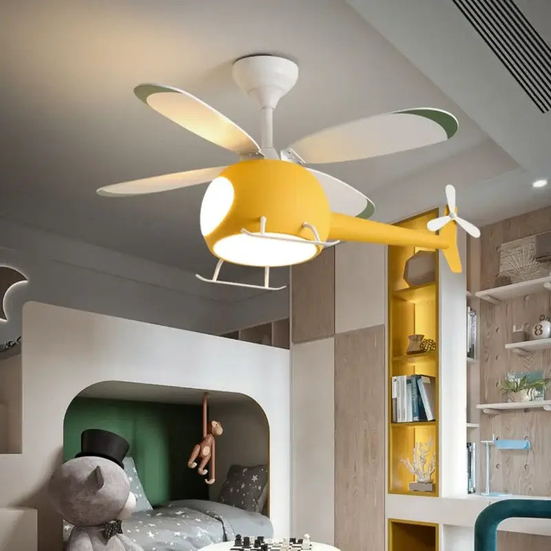 Yellow aircraft ceiling fan chandelier with white blades and LED light fixture featuring remote dimming by DecorBites™