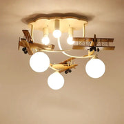 Decorbites wooden airplane chandelier light with three spherical bulbs and cloud-shaped base for nursery room ceiling
