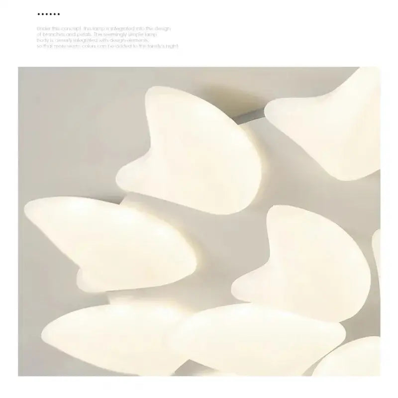 White smooth-surfaced butterfly-shaped elements of decorbites aisal flower ceiling chandelier with remote dimming