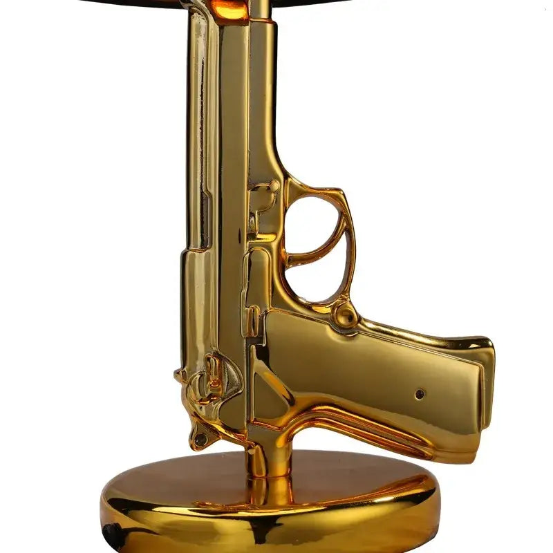 Golden ak47 guns floor lamp with reflective metallic finish and circular base by decorbites for luxury decor