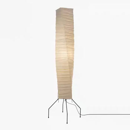 Tall beige akari noguchi floor lamp with ribbed rice paper shade and black metal tripod base for living room decor