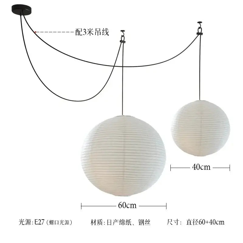 White spherical pendant lights made of japanese washi paper and steel wire with akari noguchi led design hanging