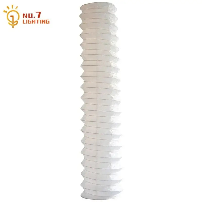 White accordion-style paper pendant light with tiered design from decorbites akari noguchi collection