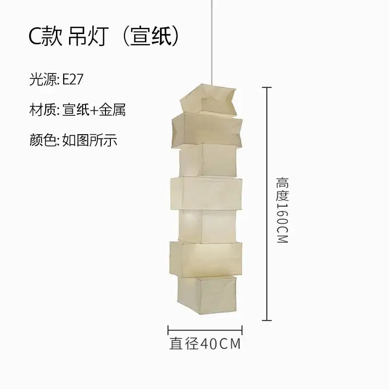A modern DecorBites™ akari noguchi floor lamp with stacked translucent off-white rice paper cubes and metallic frame