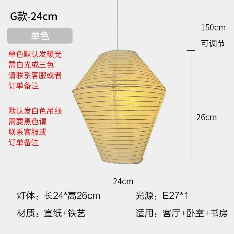 A warm yellow hexagonal pendant light made of rice paper and iron wire from decorbites akari noguchi series
