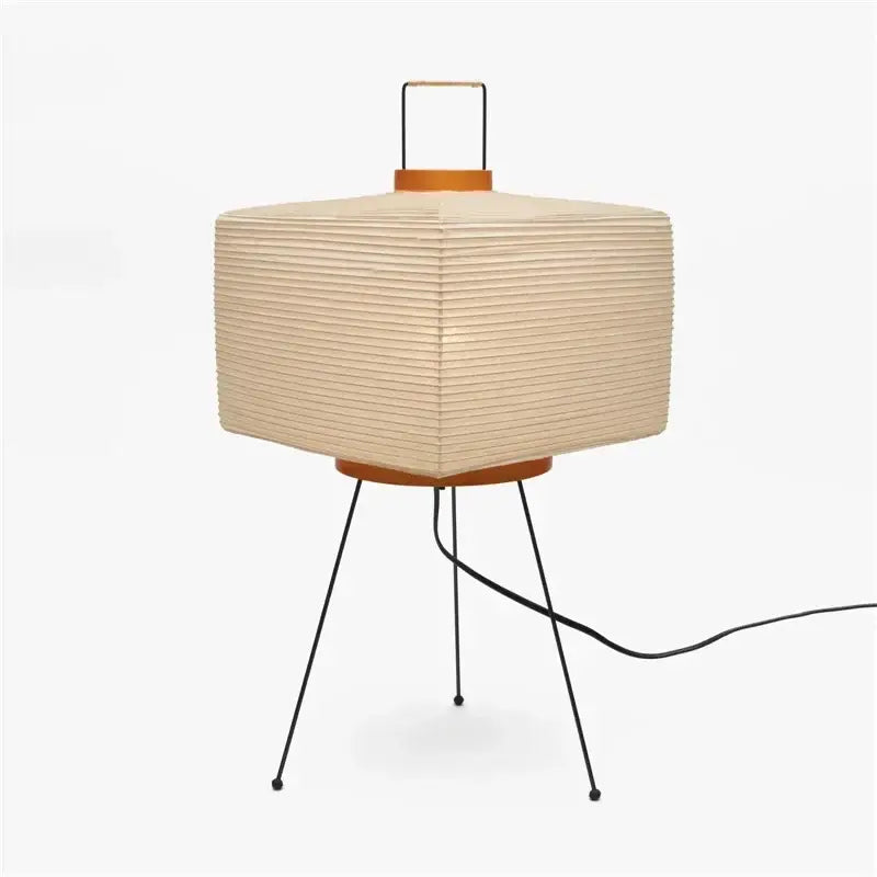 Beige pleated akari noguchi rice paper table lamp with wooden accents on black metal tripod base for living room
