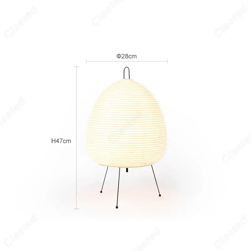 Cream-colored ribbed rice paper table lamp with black metal tripod base decorbites™ akari noguchi table lamp