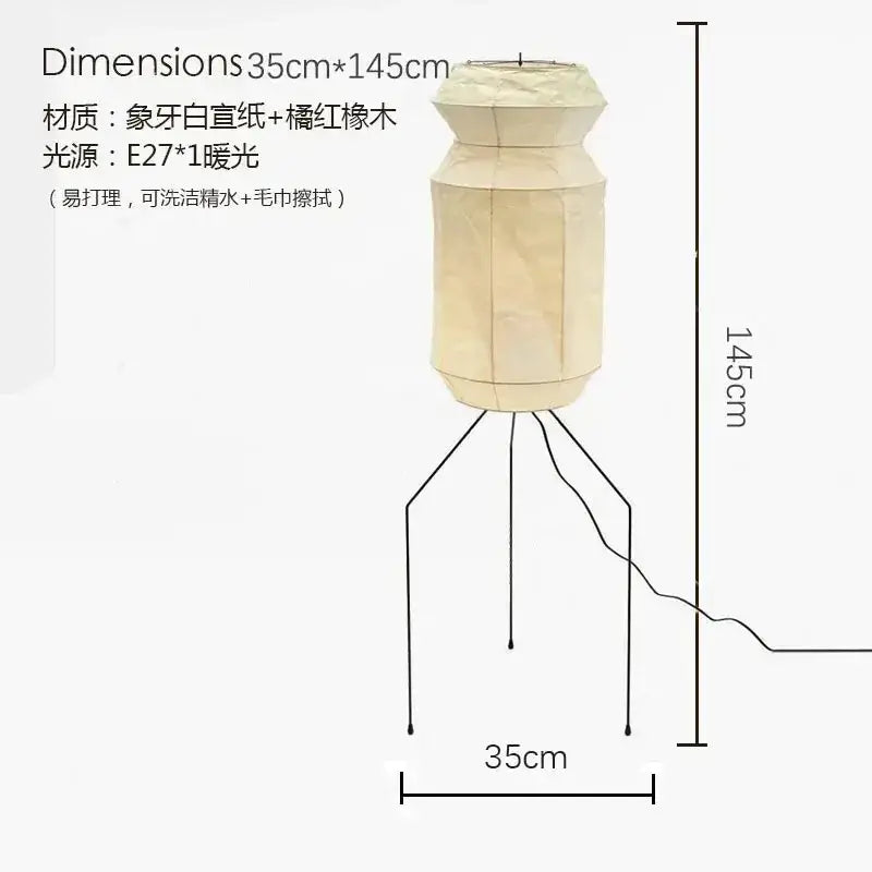 Cream-colored akari noguchi table lamp with geometric rice paper shade and tripod base by decorbites
