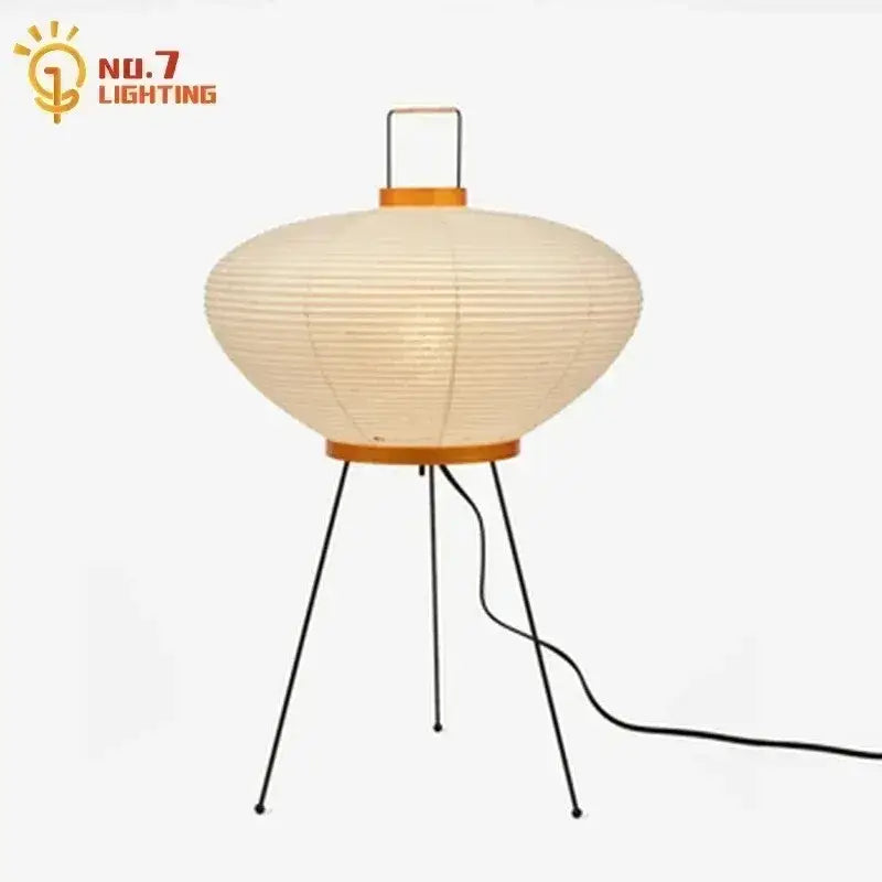 Cream-colored cream paper akari noguchi table lamp with wooden tripod base for elegant indoor lighting