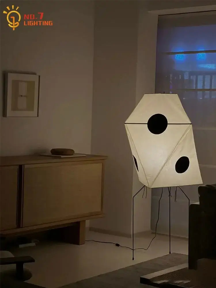 Decorbites akari rice paper floor light with white paper shade black cutouts and thin metal legs vintage stand lamp