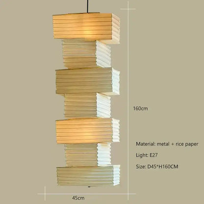 A modern akari rice paper pendant lamp with stacked gold and white rectangular tiers for living room or bedroom decor