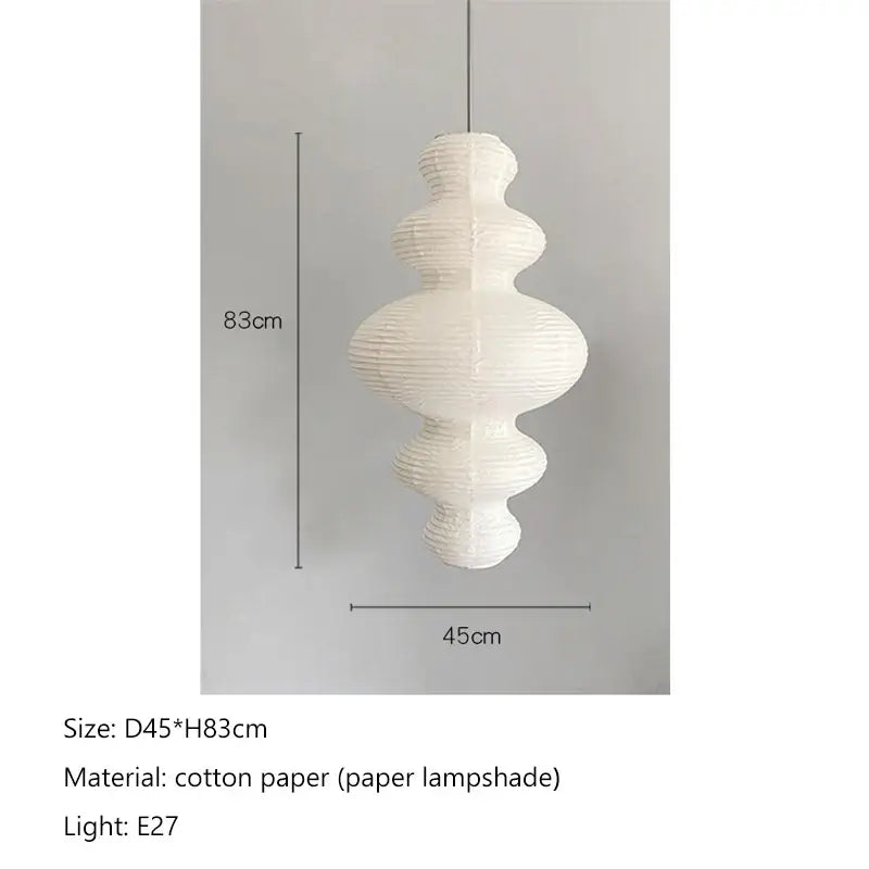 White intricately pleated cotton akari rice paper pendant lamp with tiered sculptural design for living room or bedroom