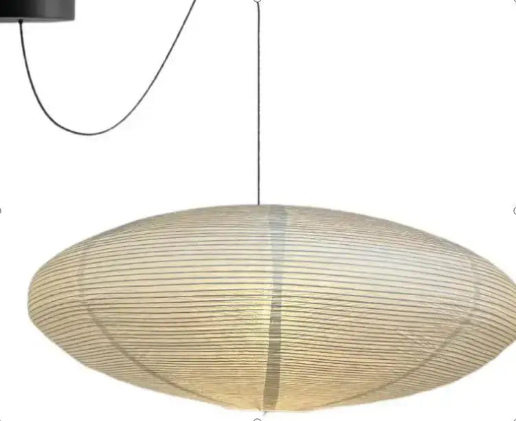 Cream-colored akari rice paper pendant lamp with woven texture and black cord for living room and bedroom lighting