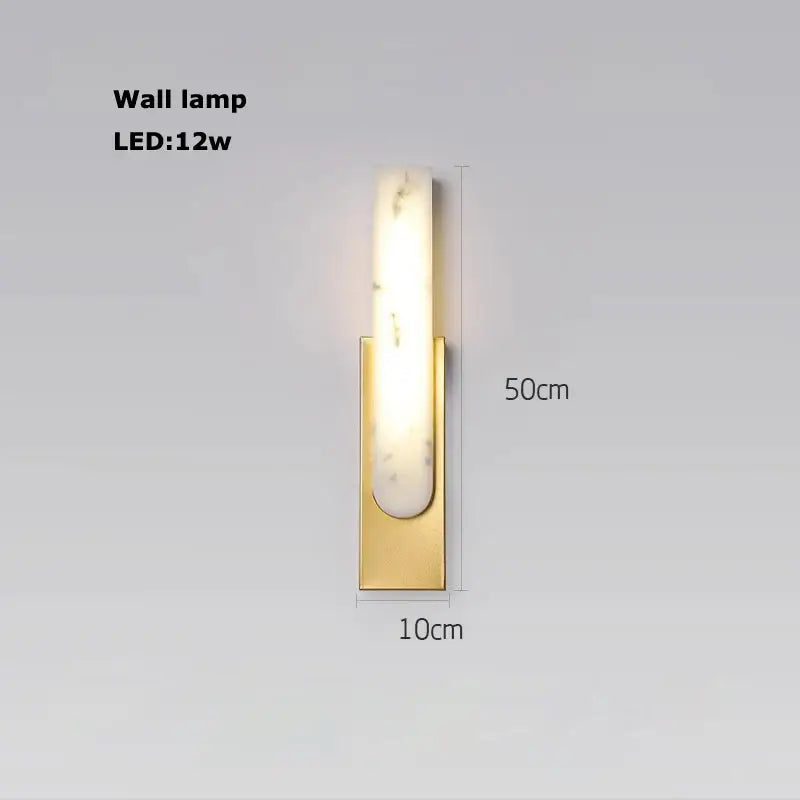 Modern wall lamp with alabaster gold chrome base and marble-patterned glass diffuser for warm living room lighting