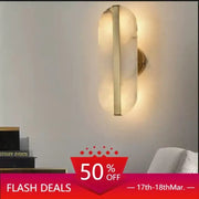 Modern minimalist wall lamp DecorBites™ alabaster oval marble with frosted glass diffuser and brushed brass frame for indoor use