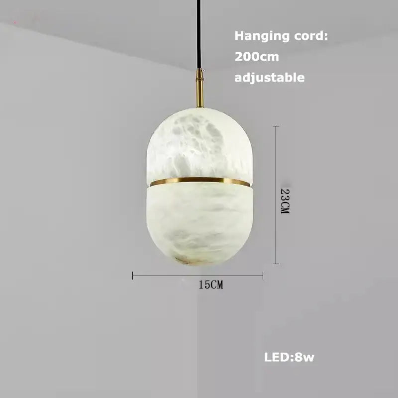 Decorbites™ alabaster pendant lights with frosted white marble-textured glass globe and gold metal accents for living room