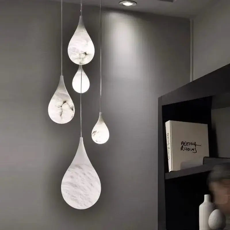 DecorBites™ alabaster pendant lights with white marble effect and subtle gray veining for living room lighting