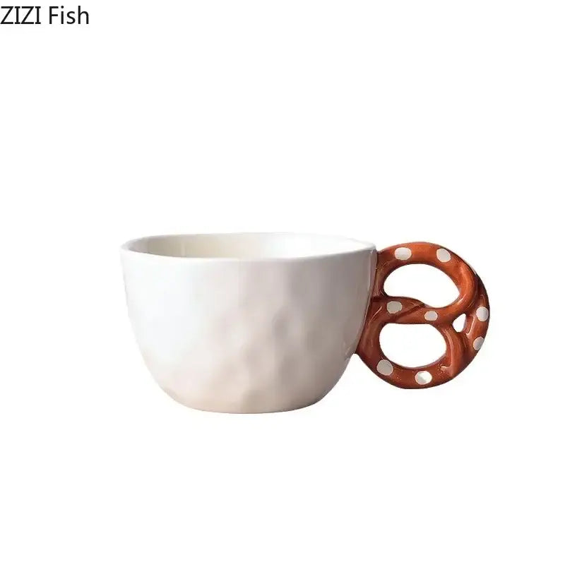 White ceramic mug from DecorBites alkali water biscuit mug set with brown polka dot pretzel-shaped handle