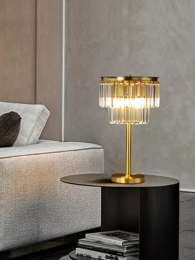 Gold-toned brass crystal floor lamp with cascading prisms for luxury living room lighting by DecorBites