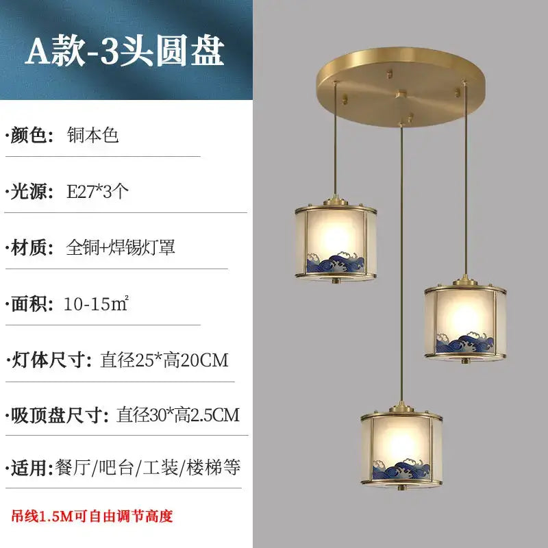 Gold-toned copper entrance pendant light with three rotating heads, blue wave glass, and brass hardware for staircase or hallway