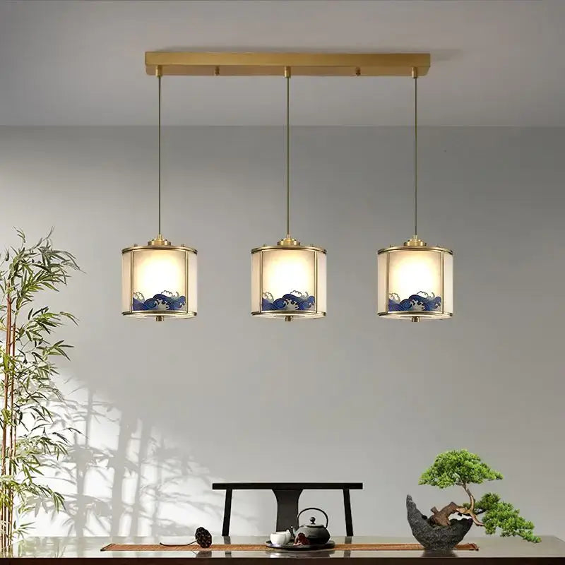 Decorbites™ all copper rotating staircase pendant light with brass frames and blue wave patterned white shades