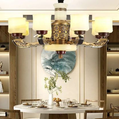 Antique brass six-light chandelier with frosted glass shades and engraved detailing in decorbites copper marble jade design