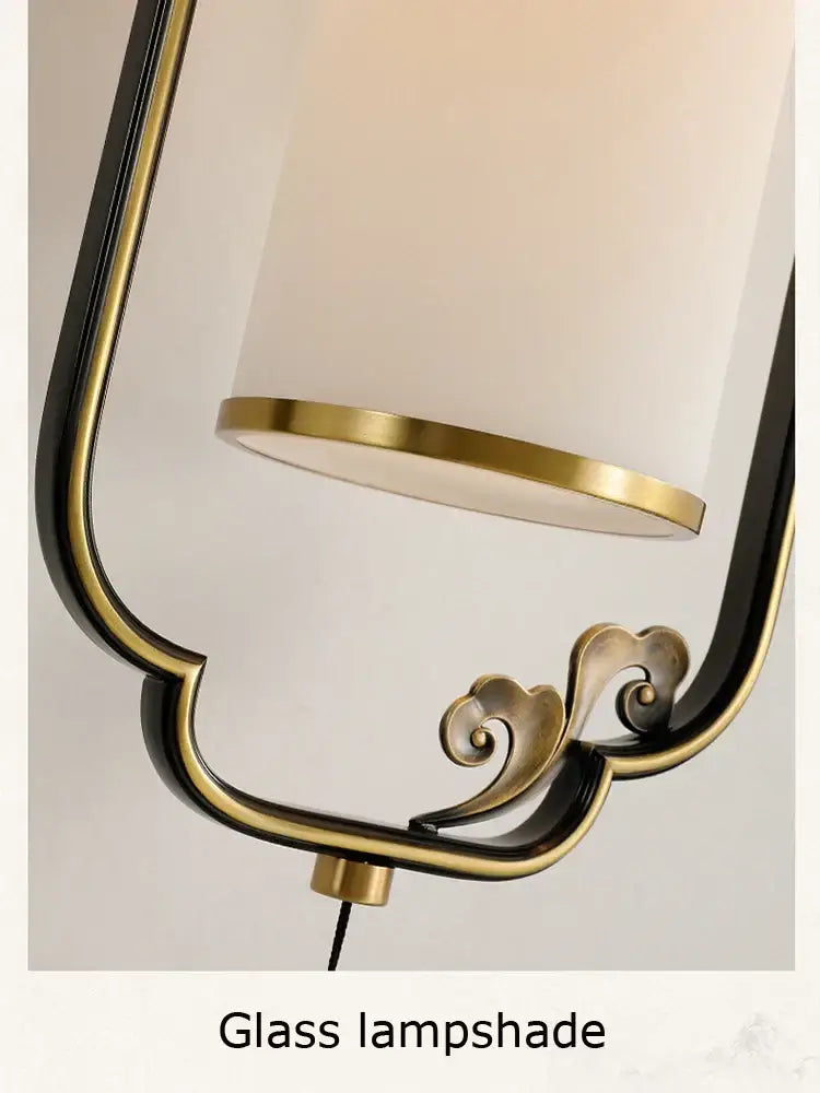 DecorBites™ copper wall lamp with frosted glass lampshade and gold-toned scrollwork for living room bedside use