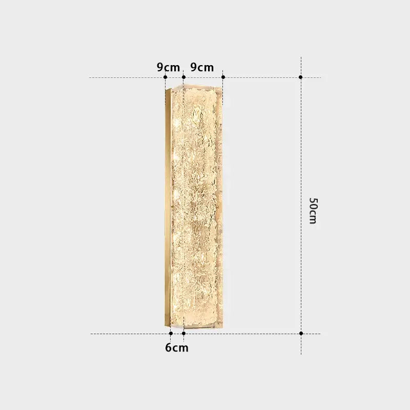 A 50cm tall decorbites™ copper wall lamp with textured gold finish and slim brass frame for light luxury bedrooms