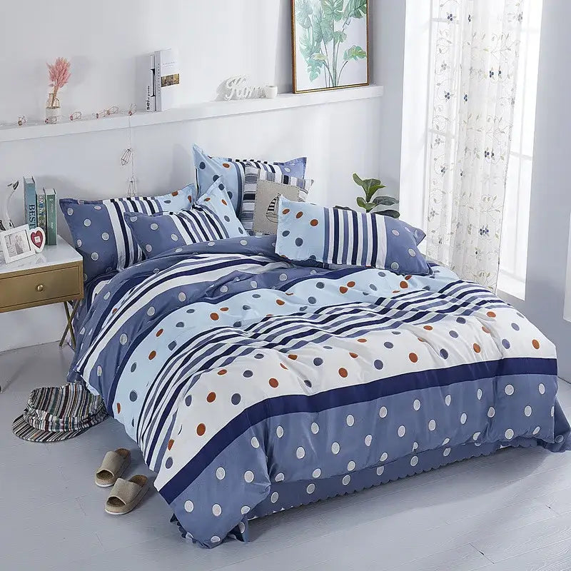 Decorbites lightweight duvet cover featuring blue and white polka dot and striped design with navy accents for luxury sleep