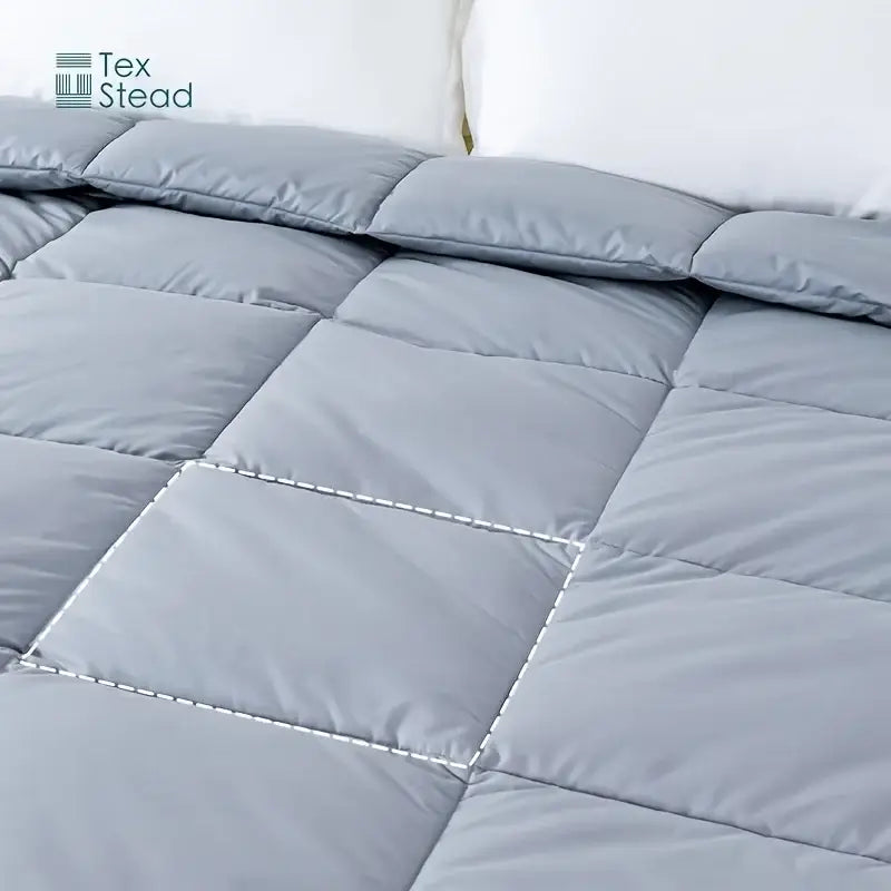 Gray quilted all season lightweight goose down comforter duvet insert with plush texture and subtle white stitching