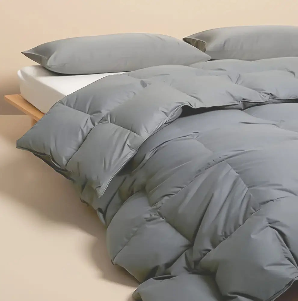 Gray quilted comforter duvet insert with soft plush texture and subtle sheen for all season lightweight goose down use