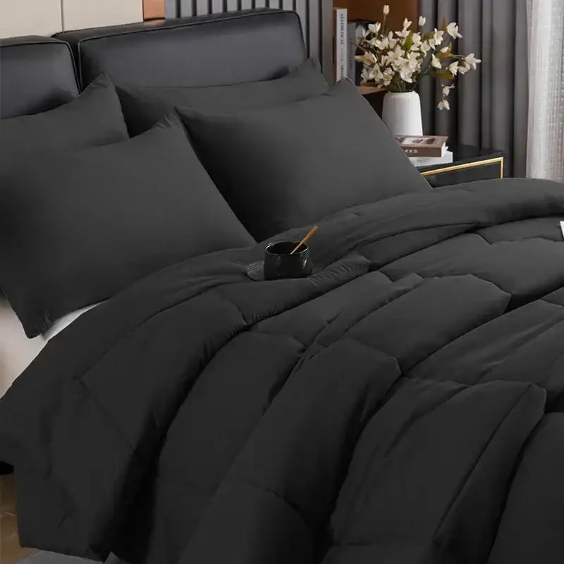 Black decorbites™ all-season quilted comforter set with plush soft texture and subtle stitching details for queen king size