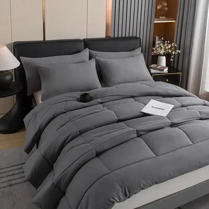 Gray DecorBites™ all-season quilted comforter set with soft plush texture and square stitched panels for queen king size